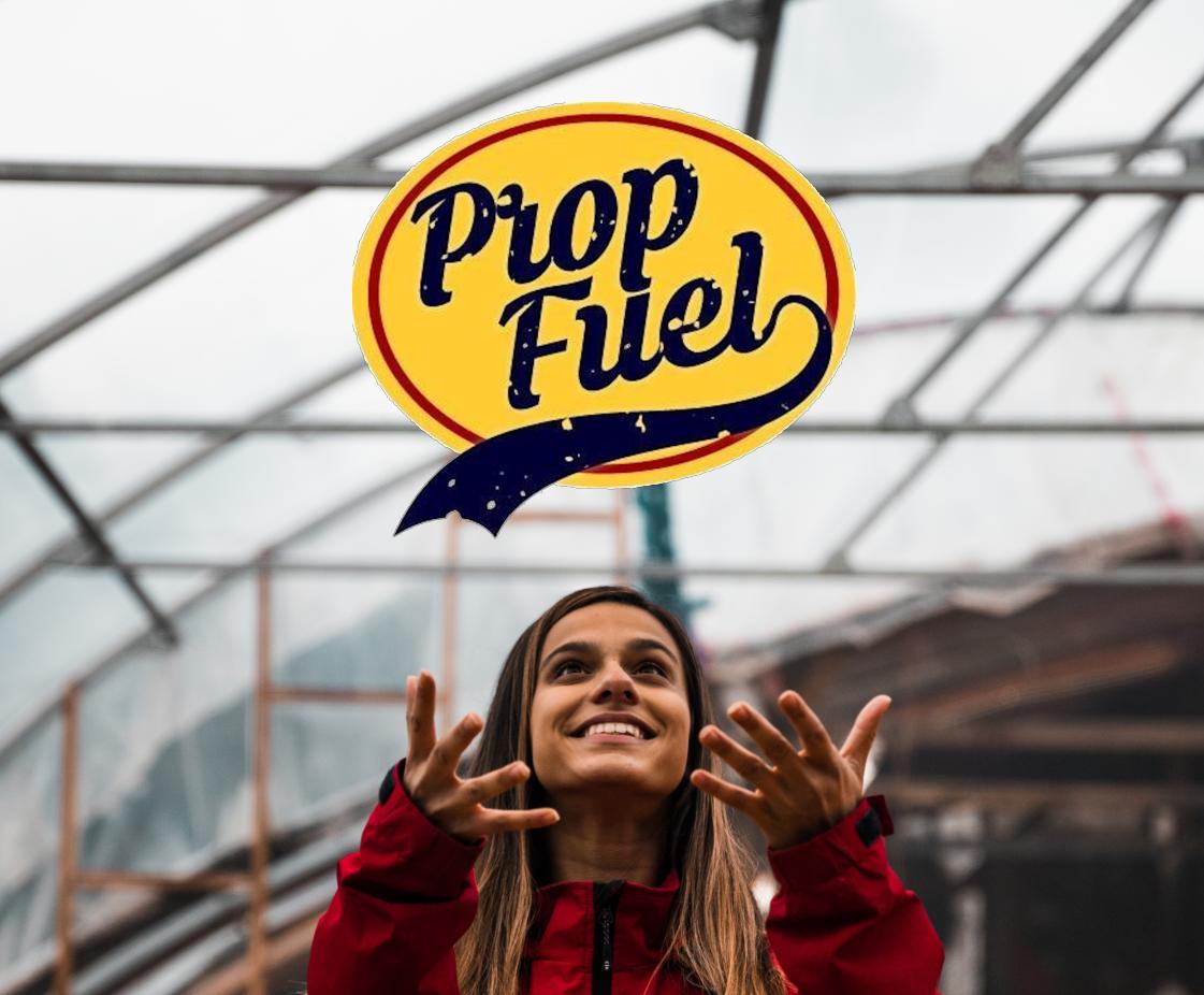 woman happily catching a PropFuel logo